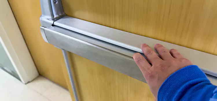 Installing a Push Bar on a Door Ansonia